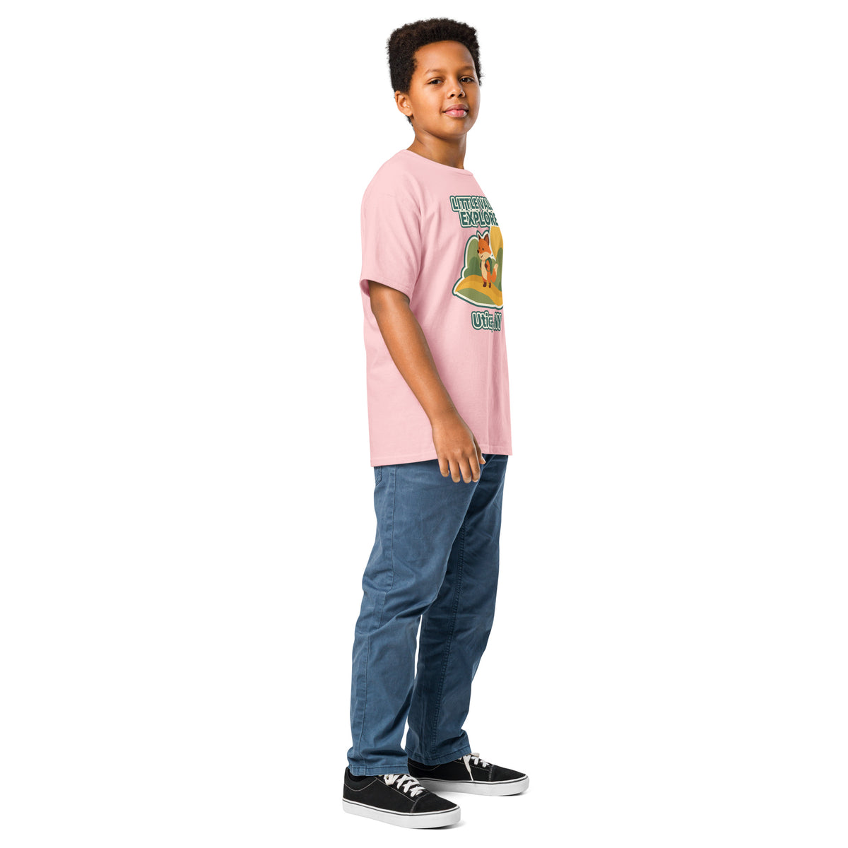 Light pink youth T-shirt with Little Valley Explorer fox graphic and Utica, NY lettering, side view on a model